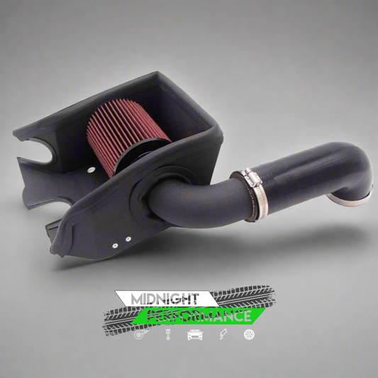 A black high-flow air intake system for a 1.4 TSI EA211 engine, featuring a red performance filter and tubing, with the 'Midnight Performance' logo in the corner.