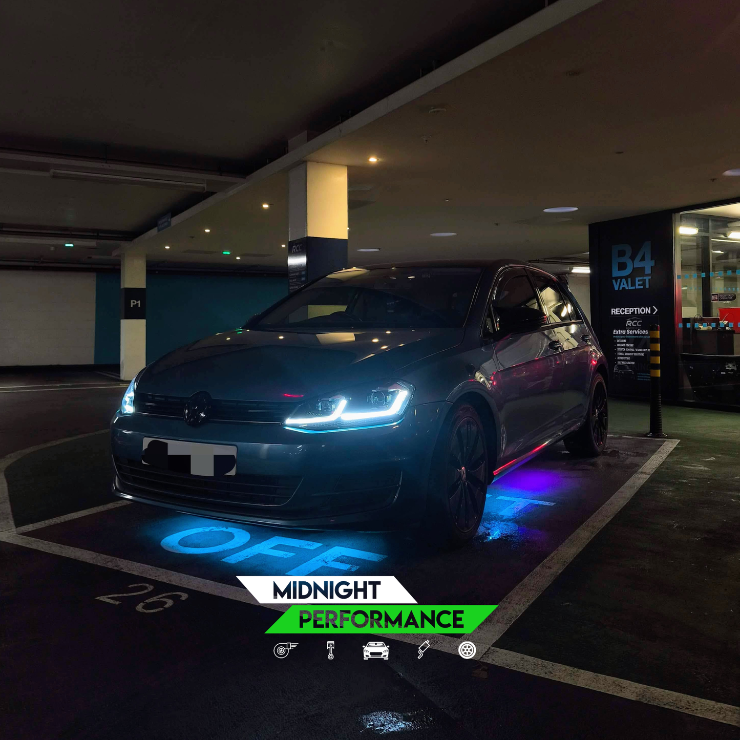 Car in a parking garage with 'Midnight Performance' text and branding.
